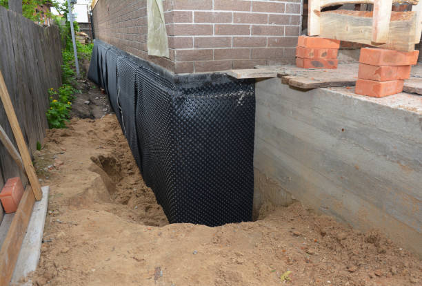 Happy homeowners after waterproofing job in Colwich
